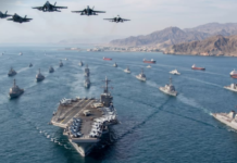 होर्मुज जलडमरूमध्य में बढ़ा तनाव, अमेरिका ने भारी सैन्य तैनाती के साथ नाकेबंदी का दावा किया